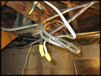 Exposed Live Electrical Cables in Ceiling